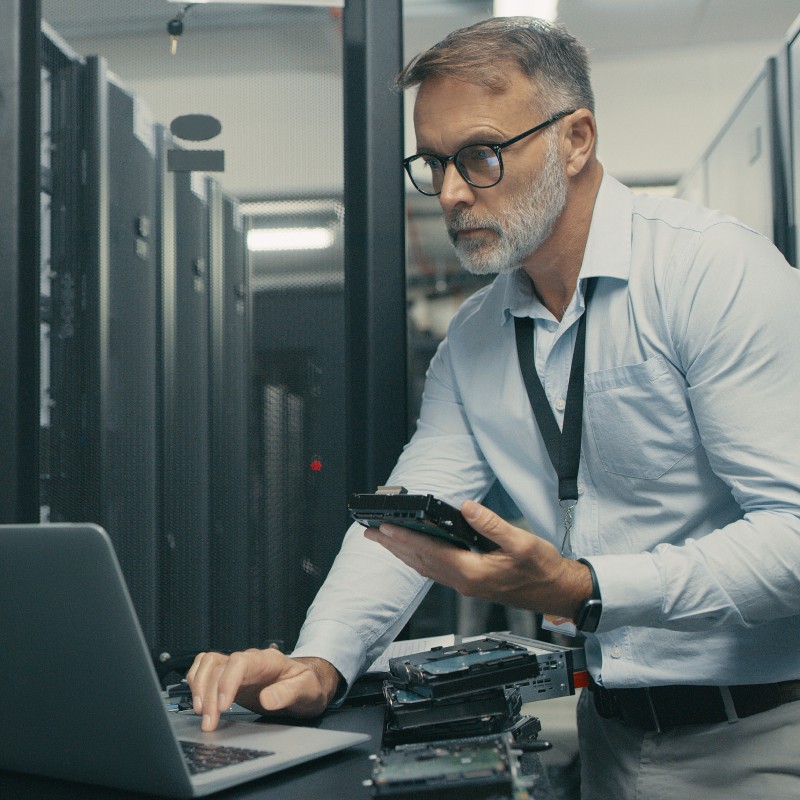 A man performing data center migration to the Azure cloud - square image.